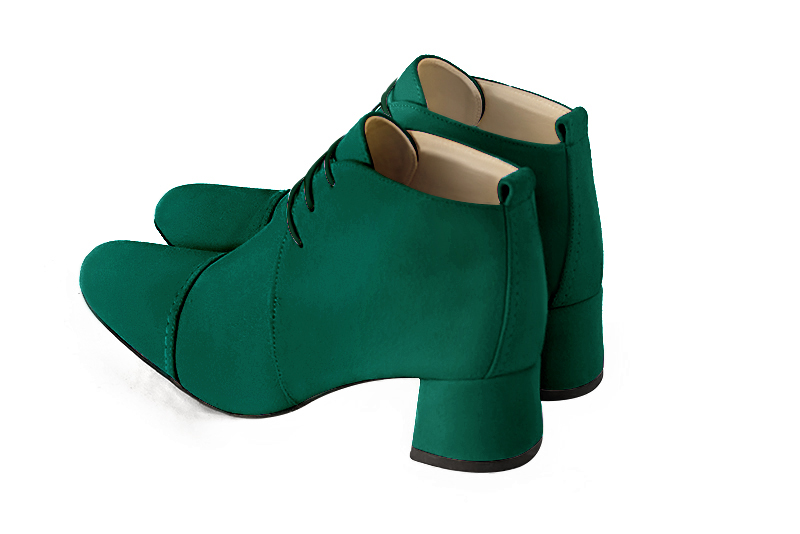 Emerald green women's ankle boots with laces at the front. Round toe. Low flare heels. Rear view - Florence KOOIJMAN